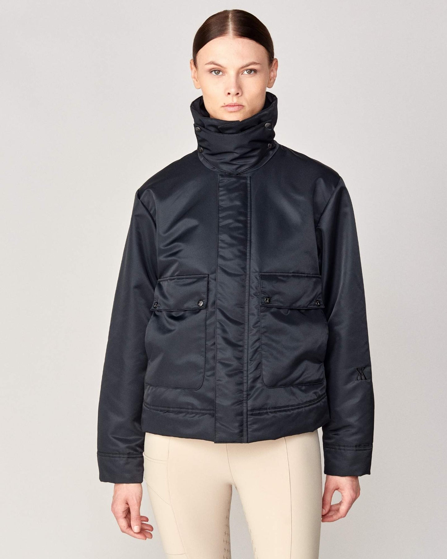 Short oversized jacket with 2-way collar in black/green Yagya