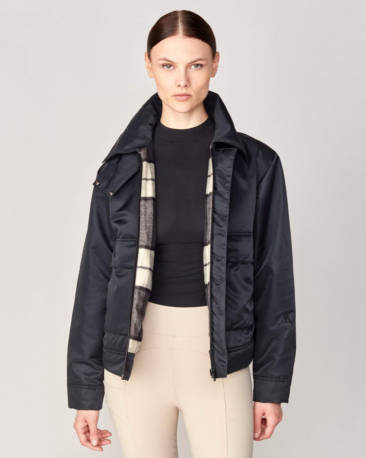 Short oversized jacket with 2-way collar in black/green Yagya