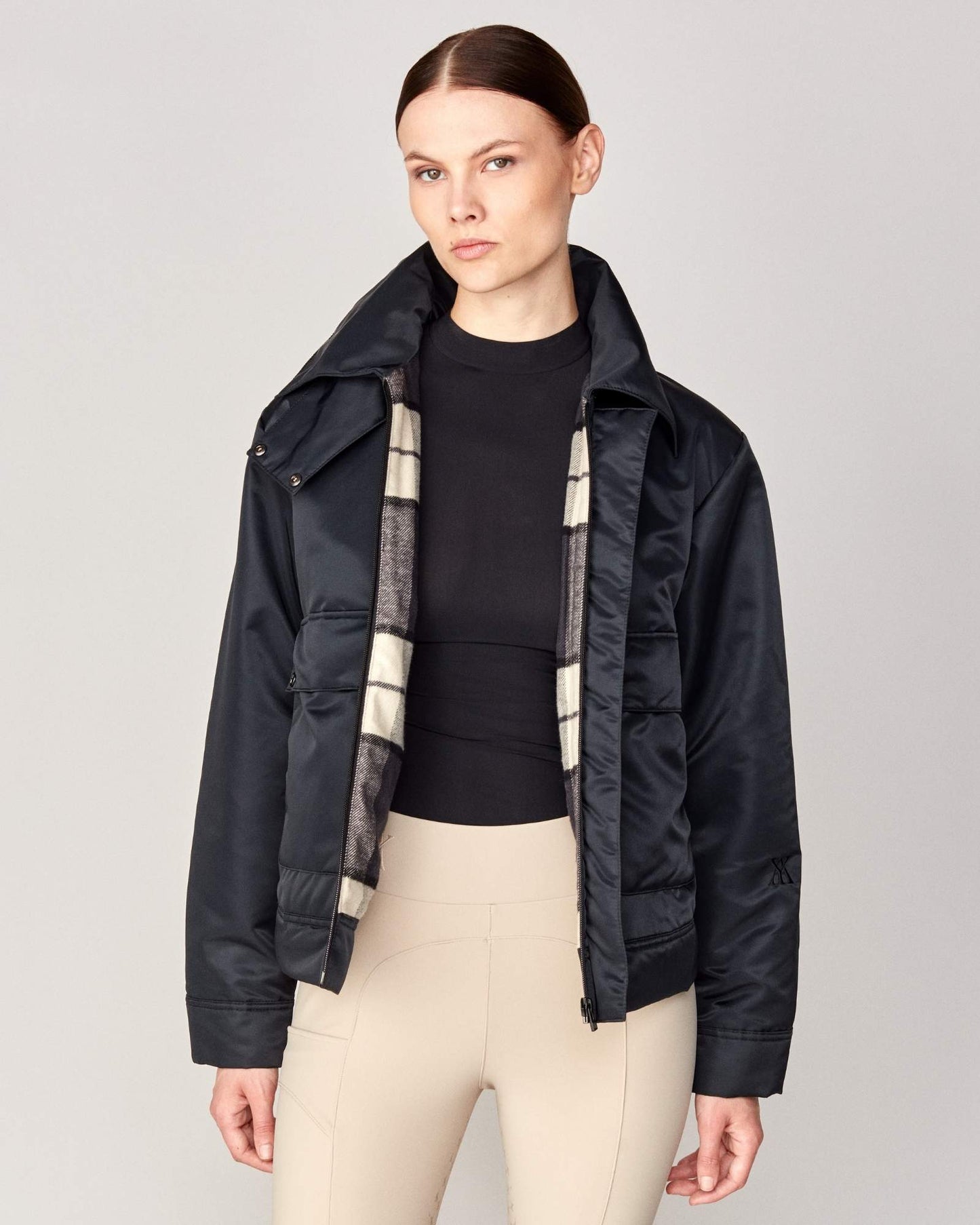 Short oversized jacket with 2-way collar in black/green Yagya
