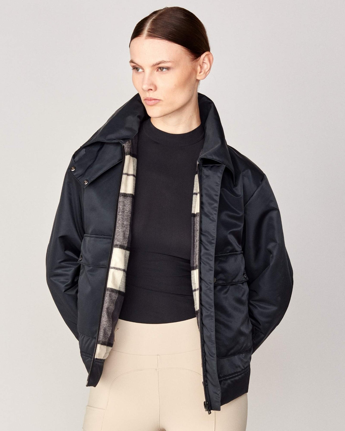 Short oversized jacket with 2-way collar in black/green Yagya