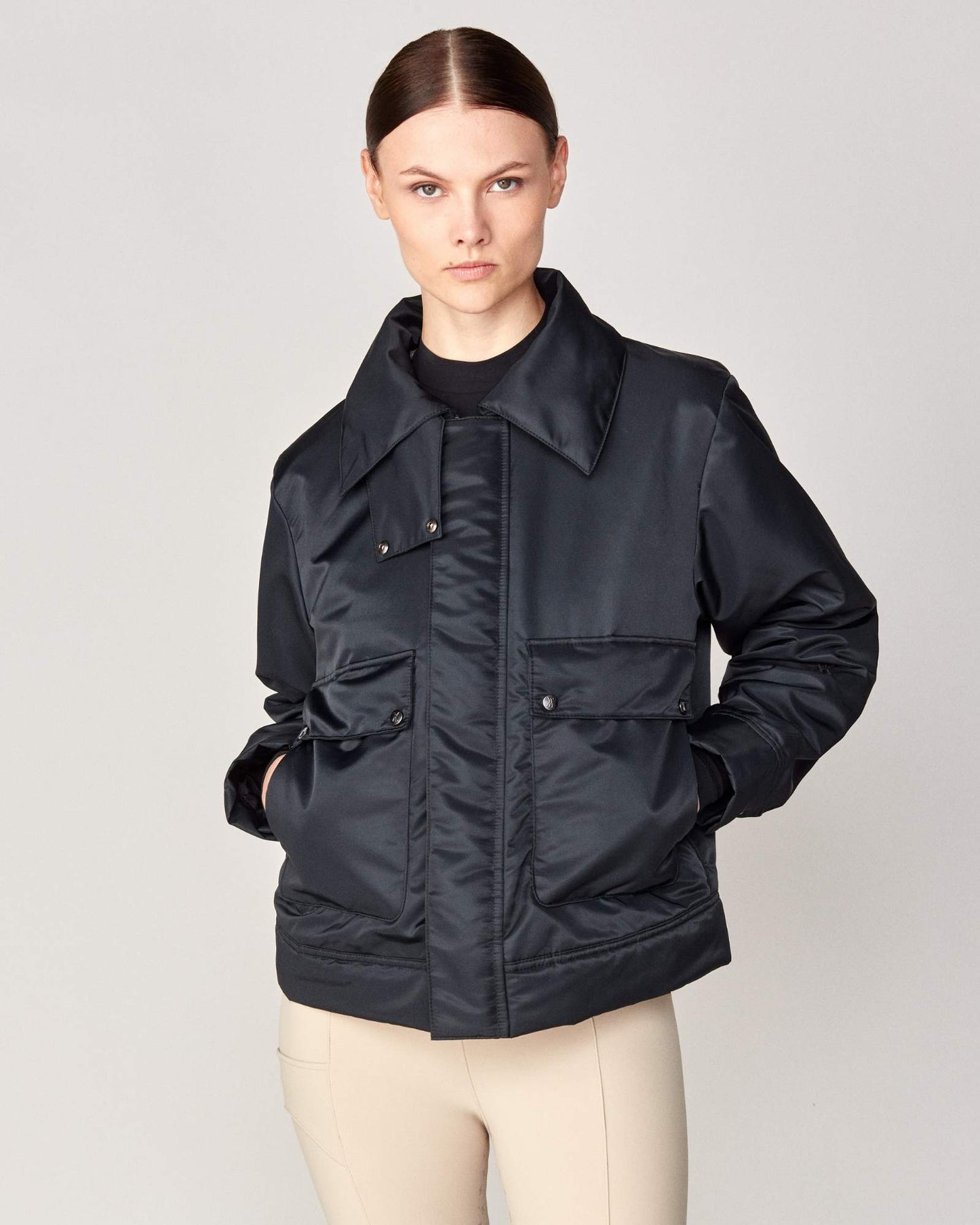Short oversized jacket with 2-way collar in black/green Yagya