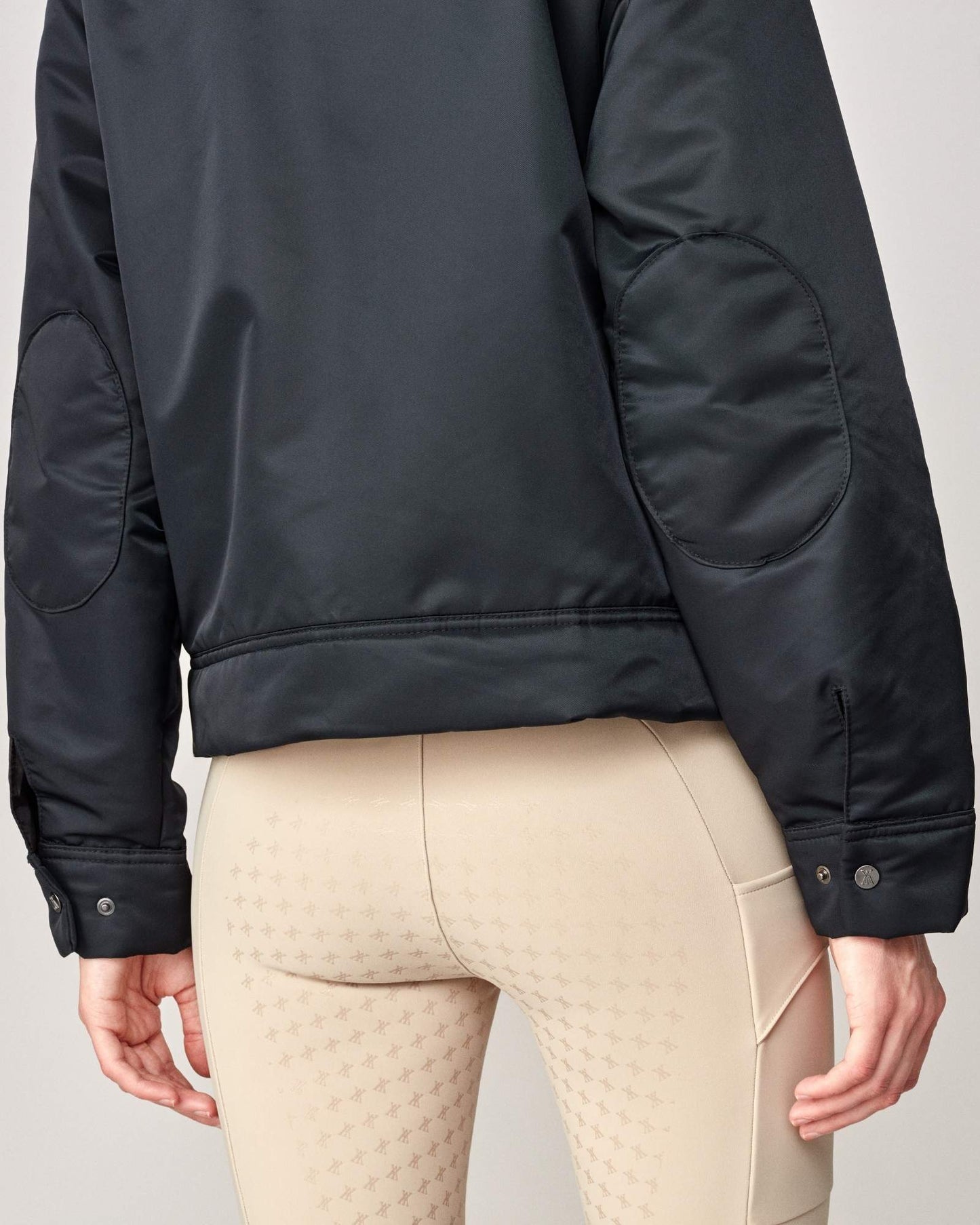 Short oversized jacket with 2-way collar in black/green Yagya