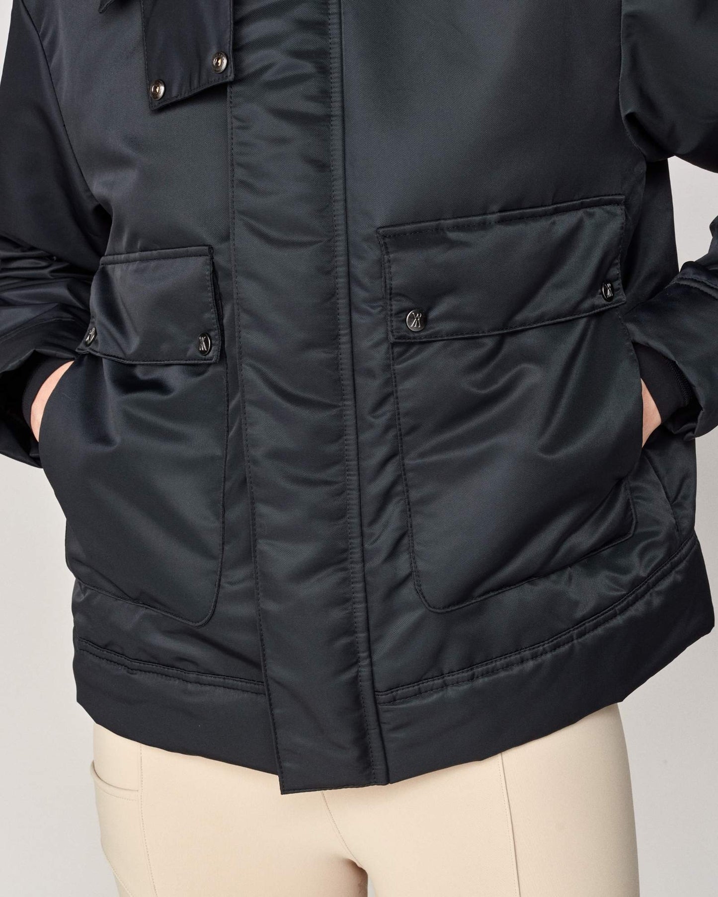 Short oversized jacket with 2-way collar in black/green Yagya