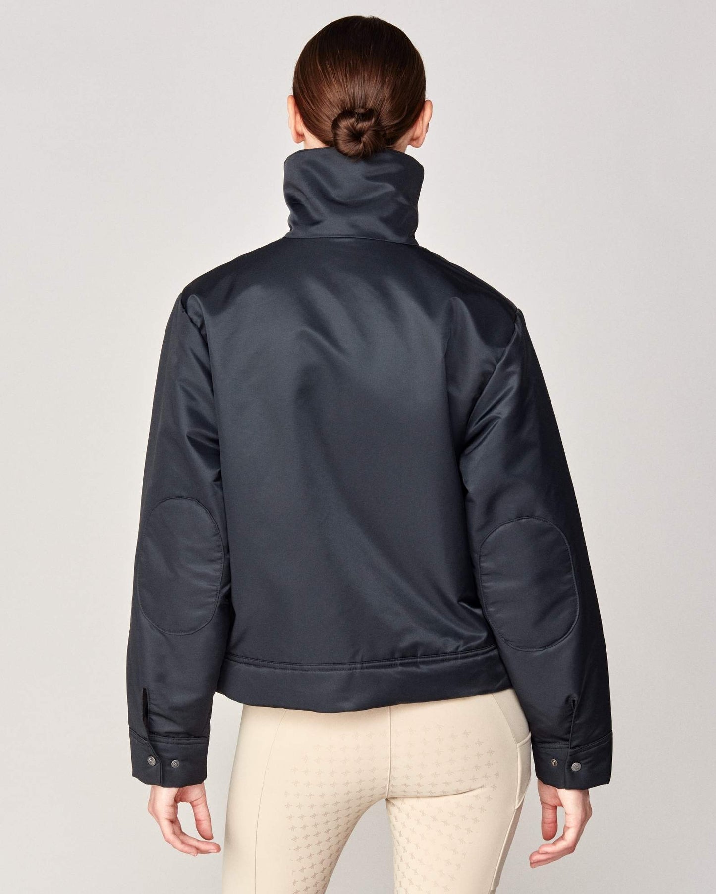Short oversized jacket with 2-way collar in black/green Yagya