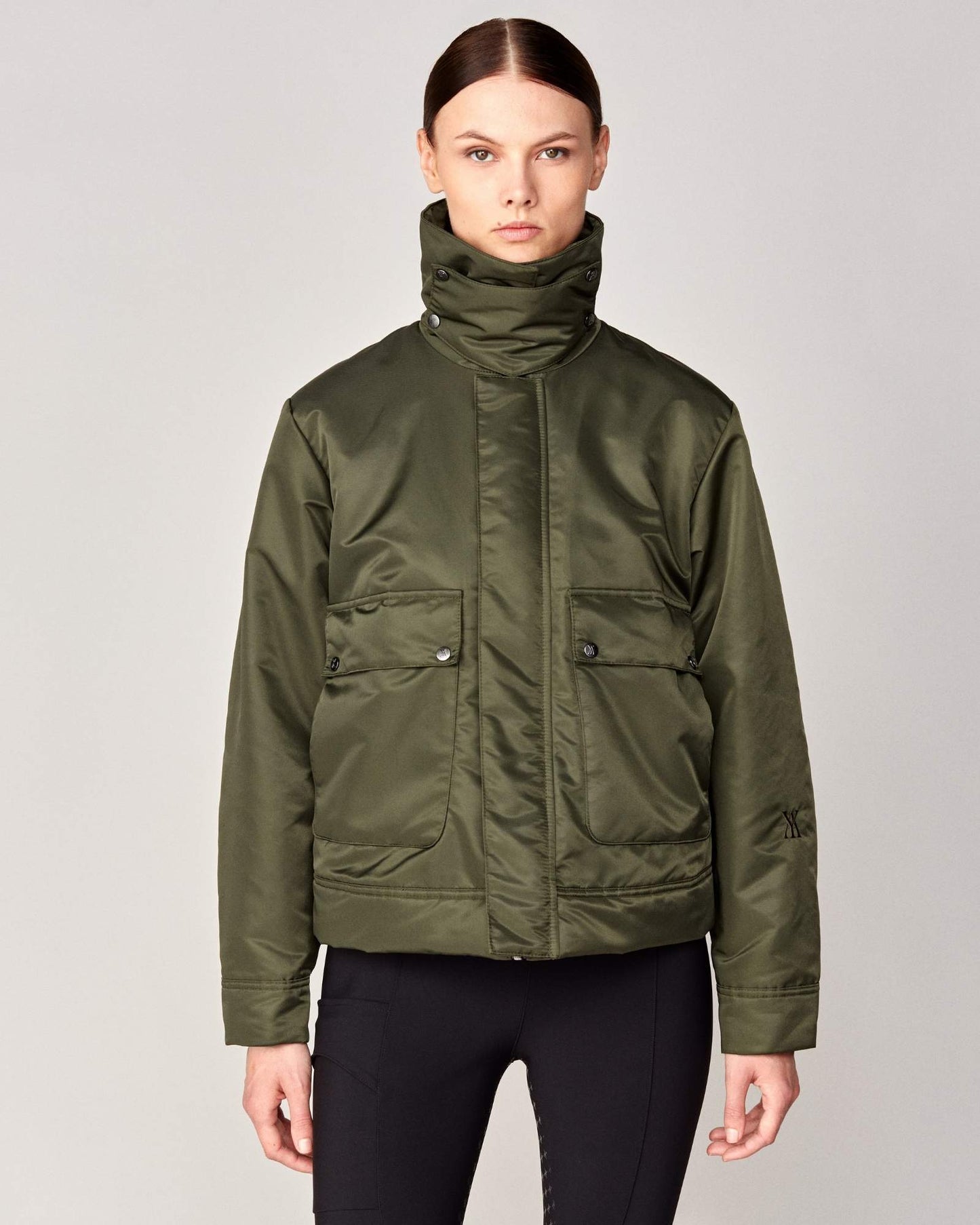 Short oversized jacket with 2-way collar in black/green Yagya
