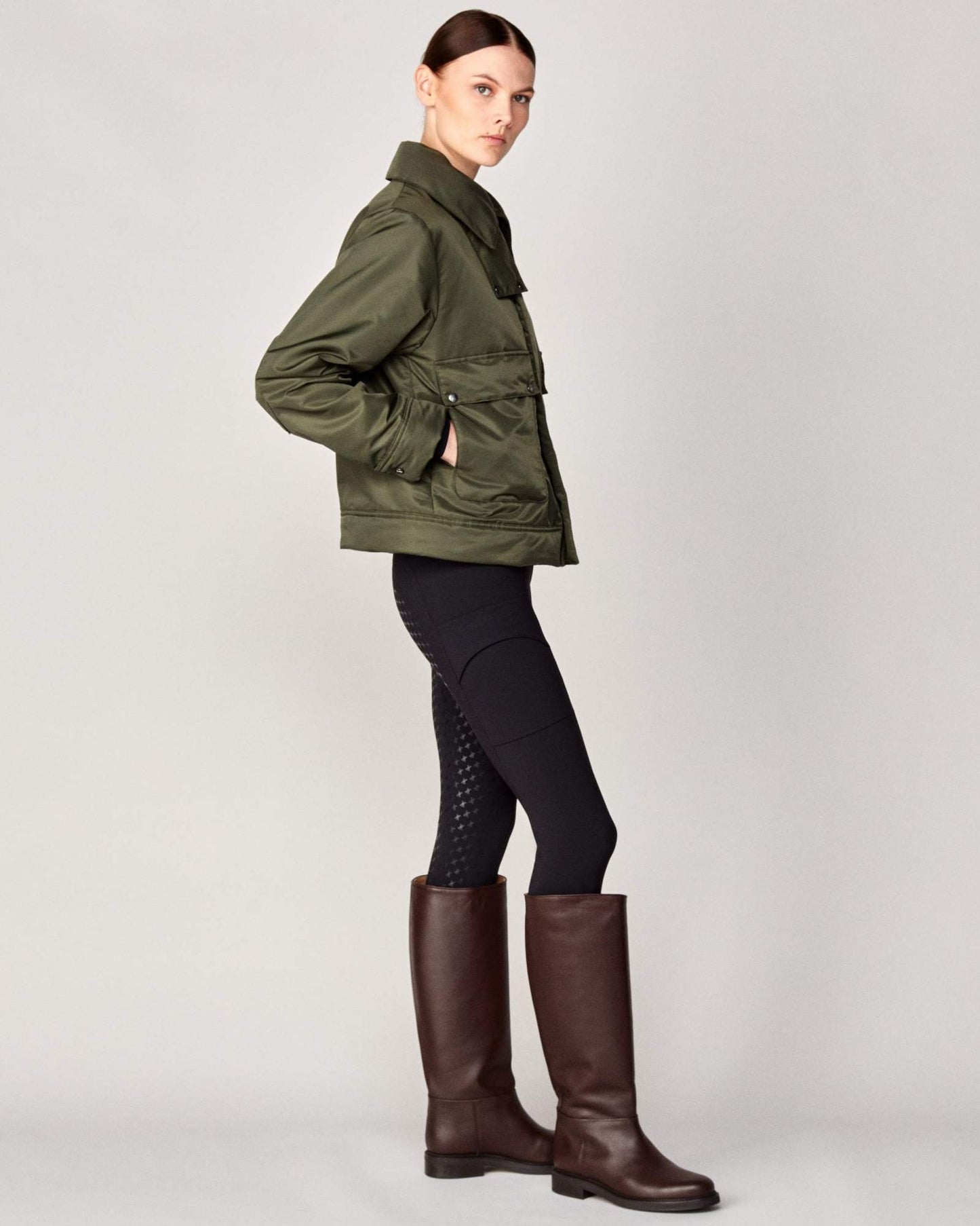 Short oversized jacket with 2-way collar in black/green Yagya