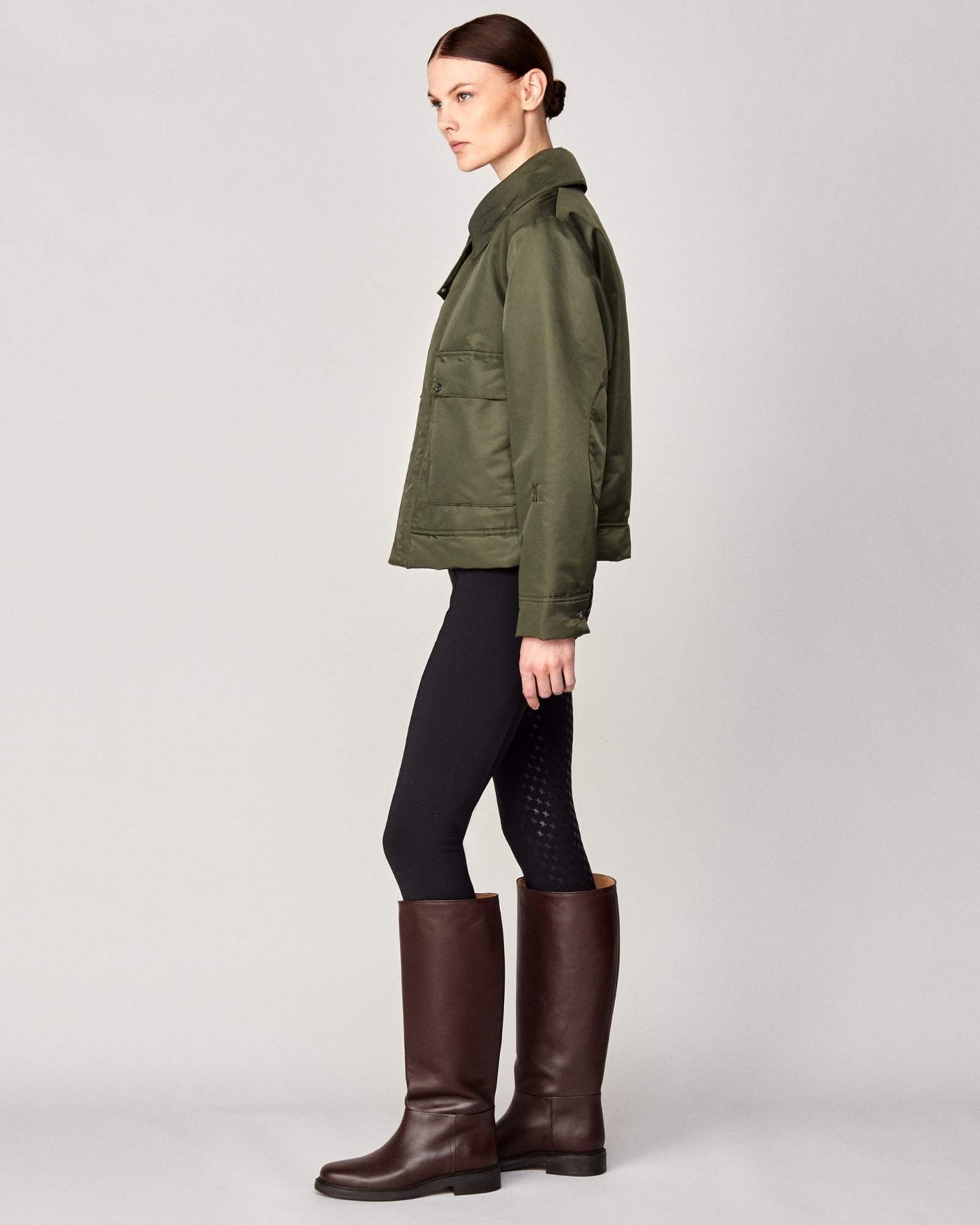 Short oversized jacket with 2-way collar in black/green Yagya