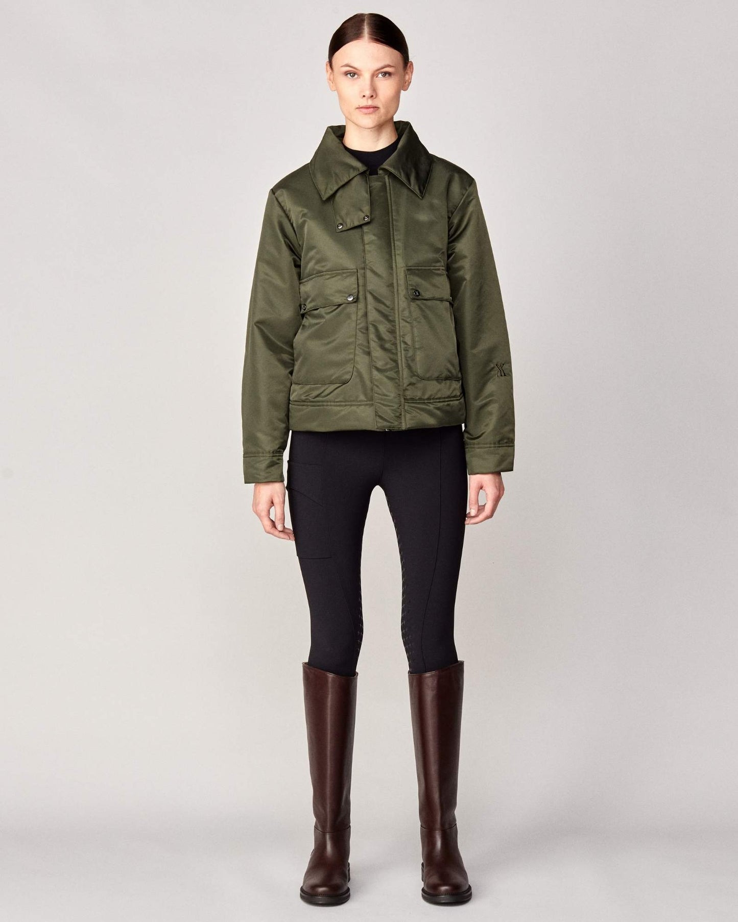 Short oversized jacket with 2-way collar in black/green Yagya